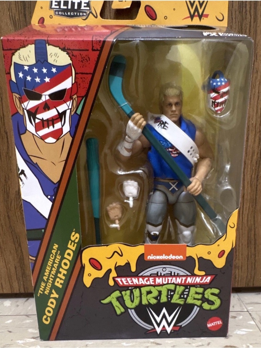 WWE Cody Rhodes Action Figure in Blue and Gray with Teal Accessory